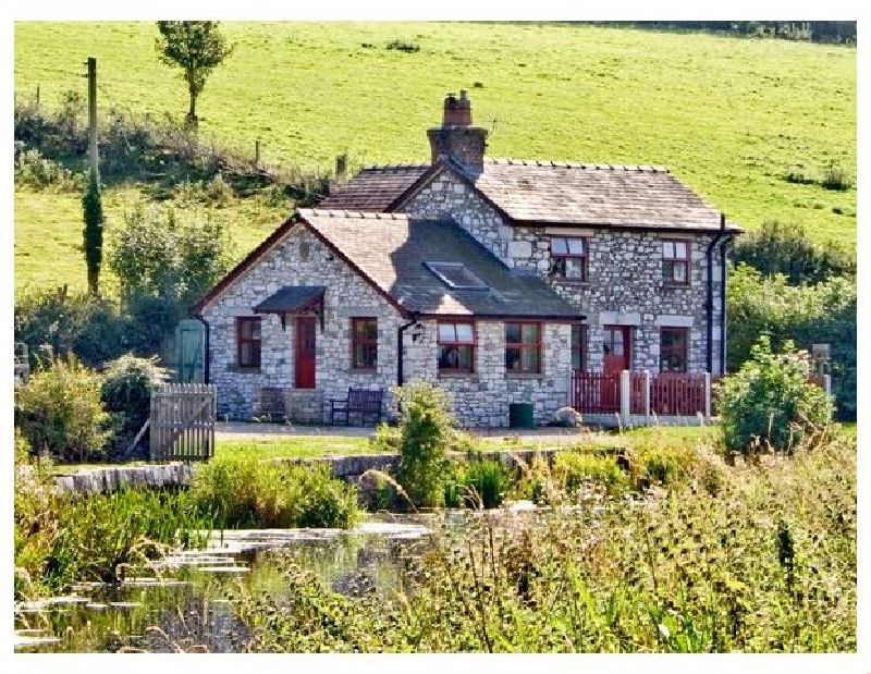 Click here for more about Wharf Cottage