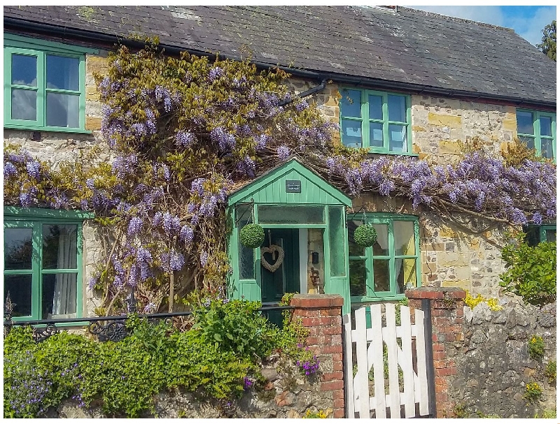 Click here for more about 2 Wisteria Cottages